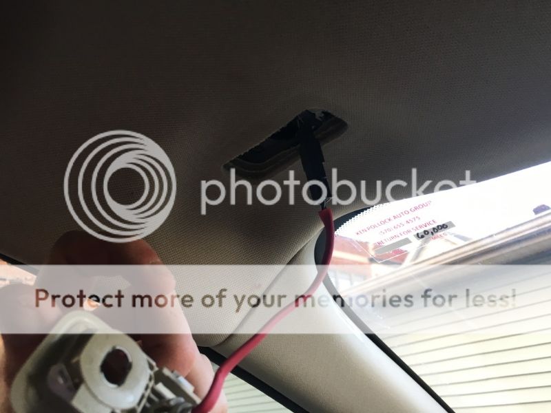 (10) The old Homelinkless visor and new Homelinkequipped visor both